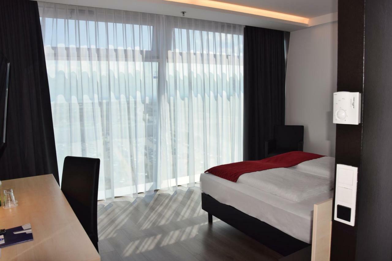 Pannonia Tower Hotel Parndorf Bagian luar foto