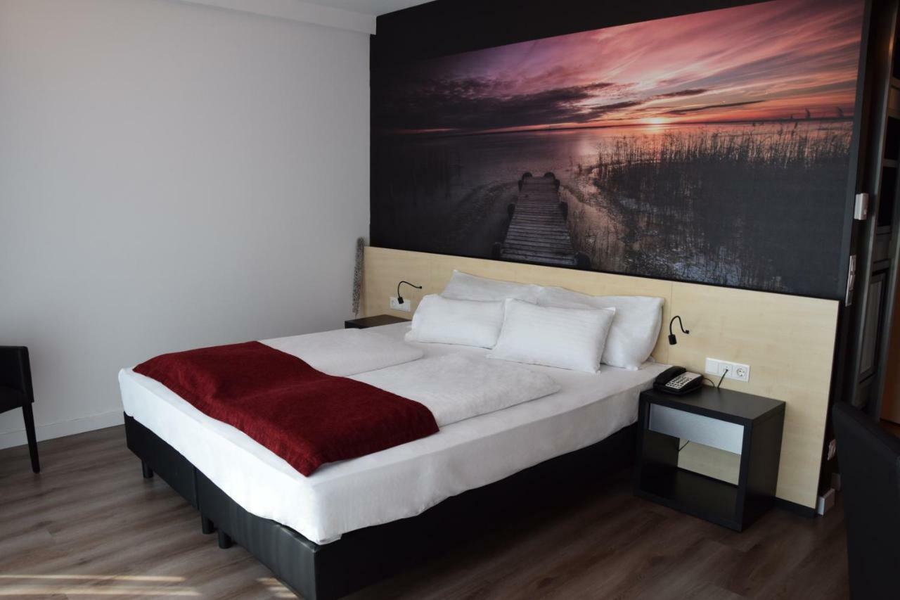 Pannonia Tower Hotel Parndorf Bagian luar foto